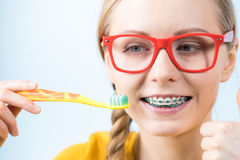 Tips for properly brushing with braces